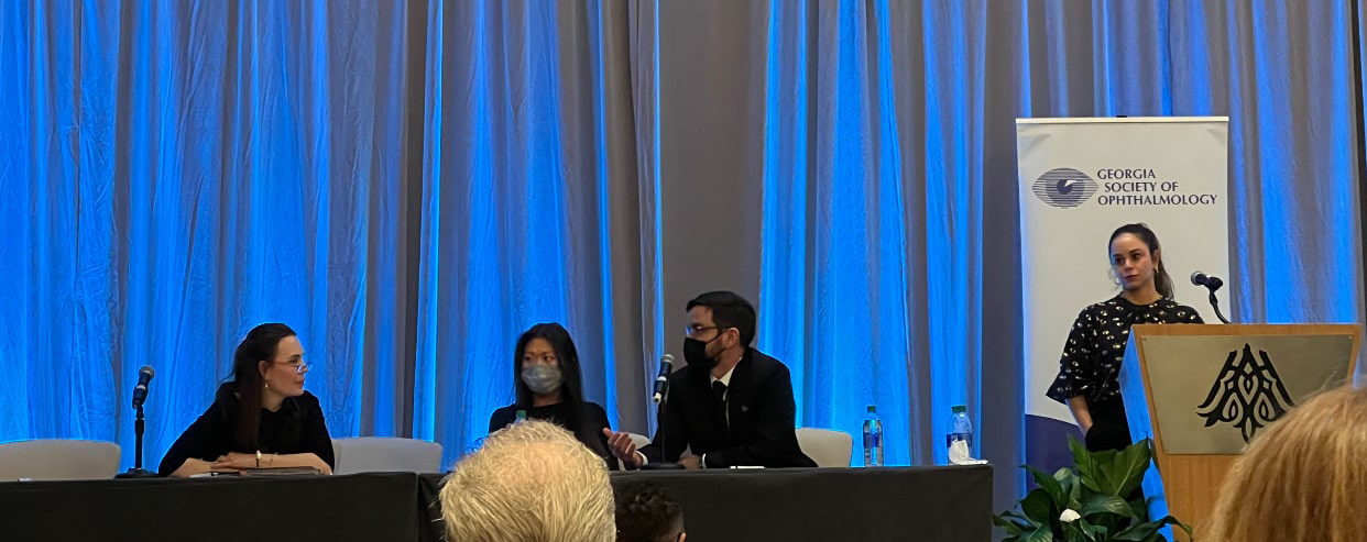 Dr. Kristin Tarbet speaking at the Georgia Society of Ophthalmology