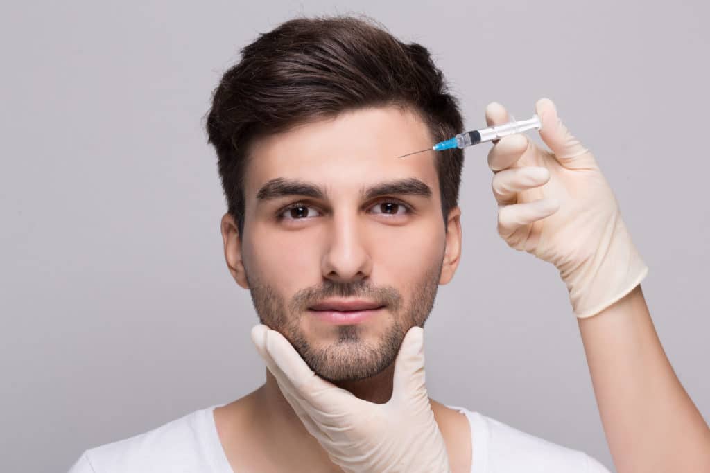 man getting botox man getting botox