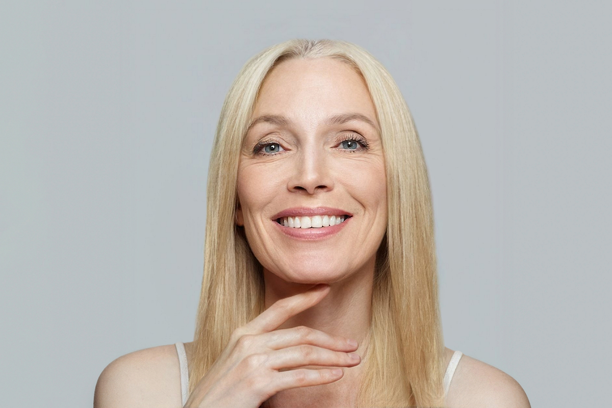 Smiling mature woman with blonde hair portrait