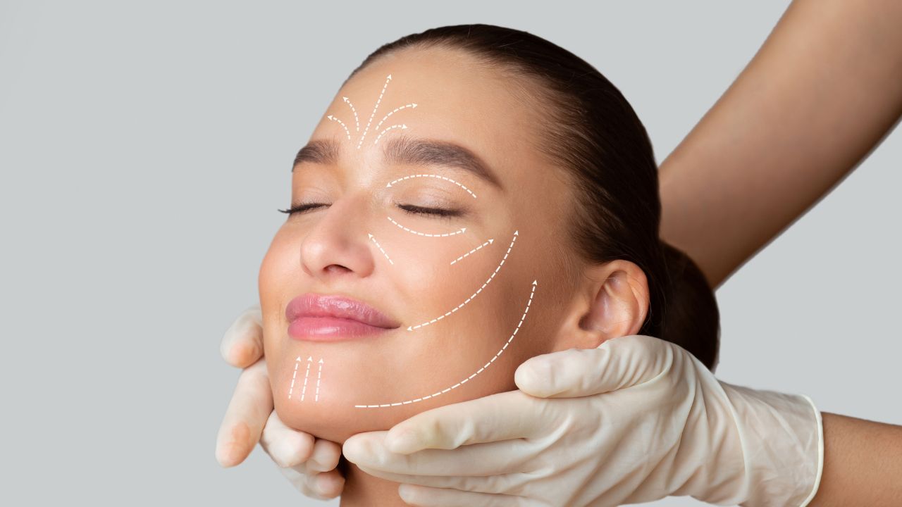 Calm girl receiving face massage